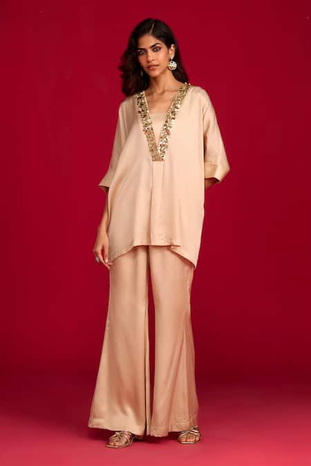 Megha Pitti_Gold Modal, Satin Sequins, Embroidery V-neck Hand Top With Bell Bottom Pant _Online_at_Aza_Fashions