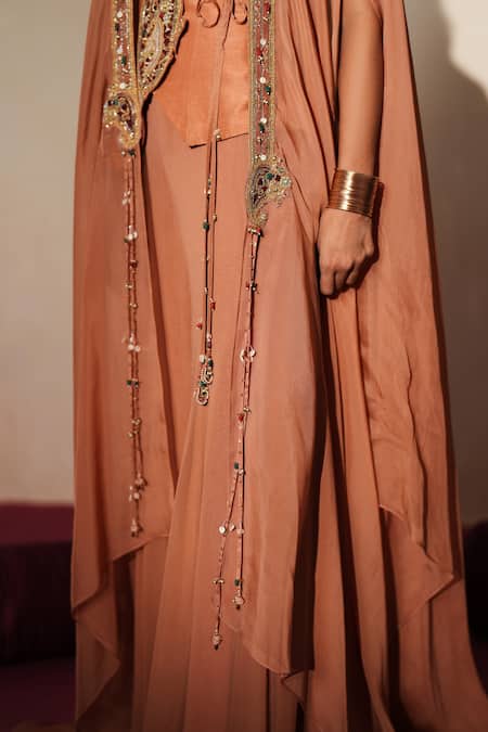 Shop_ISHA GUPTA TAYAL_Peach Silk Embroidery, Stones, Patchwork V-neck, Open Morni Cape Sharara Set _Online_at_Aza_Fashions