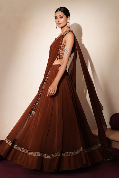 ISHA GUPTA TAYAL Brown Silk Embroidery, Patchwork, Cut Work, Zari, Taarika Waistcoat Lehenga Set Online at Aza Fashions ISHA GUPTA TAYAL_Brown Silk Embroidery, Patchwork, Cut Work, Zari, Taarika Waistcoat Lehenga Set _Online_at_Aza_Fashions