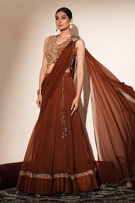 ISHA GUPTA TAYAL Brown Silk Embroidery, Patchwork, Cut Work, Zari, Taarika Waistcoat Lehenga Set at Aza Fashions ISHA GUPTA TAYAL_Brown Silk Embroidery, Patchwork, Cut Work, Zari, Taarika Waistcoat Lehenga Set _at_Aza_Fashions