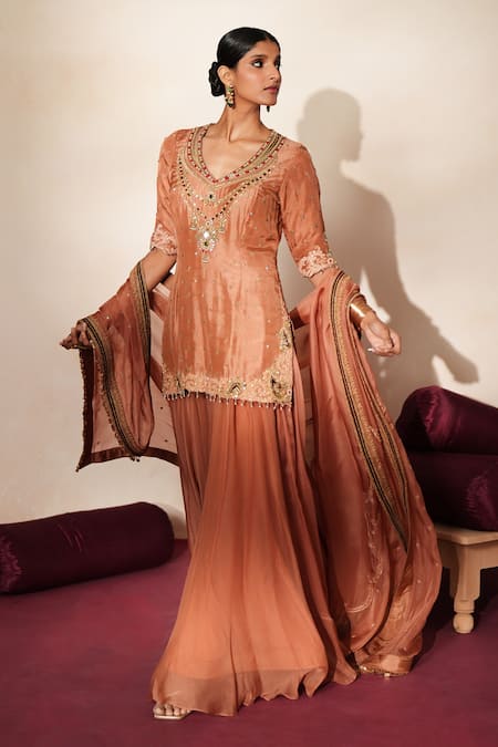 Buy_ISHA GUPTA TAYAL_Peach Silk Embroidery, Stones, Cut Work, Tassels Mrinalika Kurta Sharara Set _Online_at_Aza_Fashions