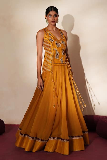 ISHA GUPTA TAYAL_Yellow Silk Embroidery, Stones, Metallic Thread V-neck Morchakra Lehenga Set _at_Aza_Fashions