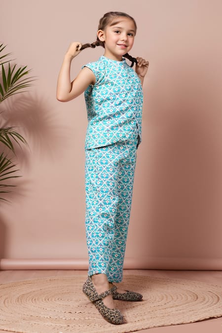 Buy Petite Pomme Blue Cotton Geometric Print Asymmetric Top And Pant Set Online at Aza Fashions Buy_Petite Pomme_Blue Cotton Geometric Print Asymmetric Top And Pant Set _Online_at_Aza_Fashions