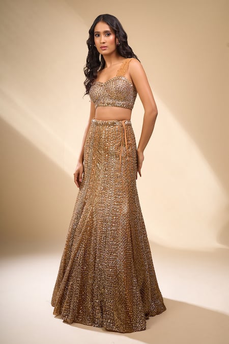 Seema Gujral_Gold Net Sequins, Beads Sweetheart Neck Embroidered Mermaid Lehenga Set _Online_at_Aza_Fashions