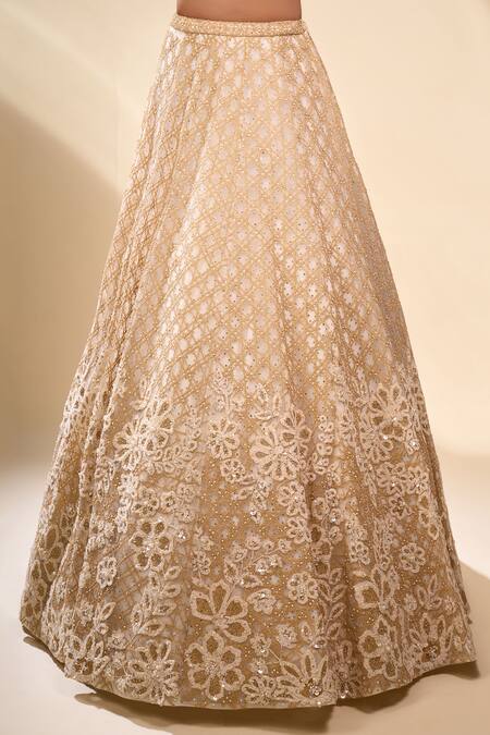 Seema Gujral Beige Net Pearls, Sequins, Embroidery V-neck Floral Lehenga Set at Aza Fashions Seema Gujral_Beige Net Pearls, Sequins, Embroidery V-neck Floral Lehenga Set _at_Aza_Fashions