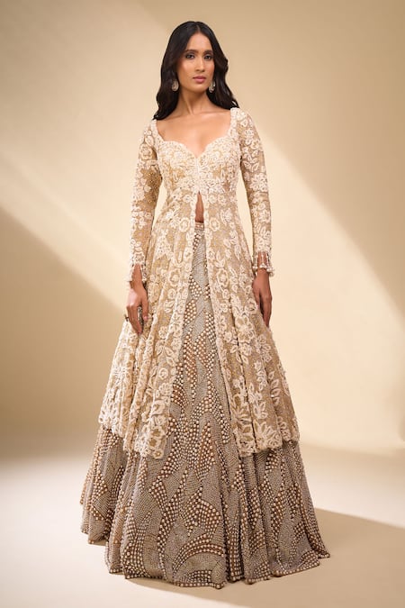 Seema Gujral_Beige Net Pearls, Embroidery, Zari V-neck Jacket Lehenga Set _Online_at_Aza_Fashions
