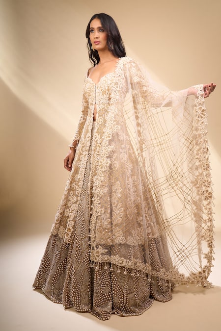 Shop_Seema Gujral_Beige Net Pearls, Embroidery, Zari V-neck Jacket Lehenga Set _Online_at_Aza_Fashions