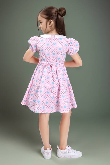 Shop Petite Pomme Pink Cotton Bows Floral Printed Sleeveless Dress at Aza Fashions Shop_Petite Pomme_Pink Cotton Bows Floral Printed Sleeveless Dress_at_Aza_Fashions