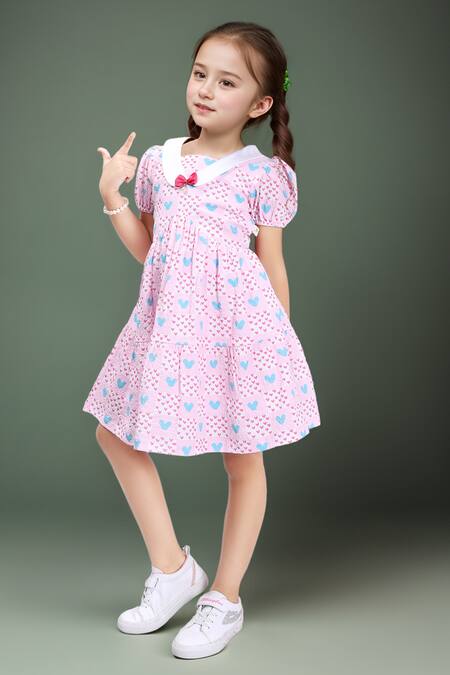 Shop Petite Pomme Pink Cotton Bows Floral Printed Sleeveless Dress Online at Aza Fashions Shop_Petite Pomme_Pink Cotton Bows Floral Printed Sleeveless Dress_Online_at_Aza_Fashions