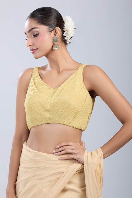 Samyukta Singhania Gold Tissue V-neck Textured Blouse at Aza Fashions Samyukta Singhania_Gold Tissue V-neck Textured Blouse _at_Aza_Fashions