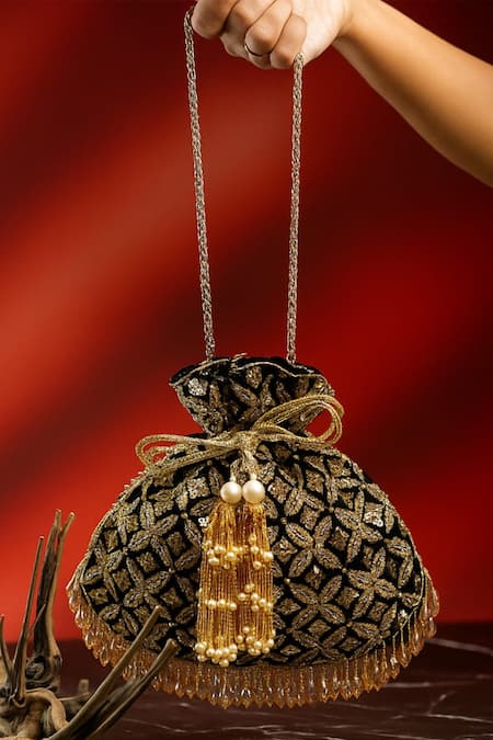 Nayaab By Sonia_Black Embroidery, Metallic Thread, Tassels, Pearls, Leafy Lattice Potli _at_Aza_Fashions