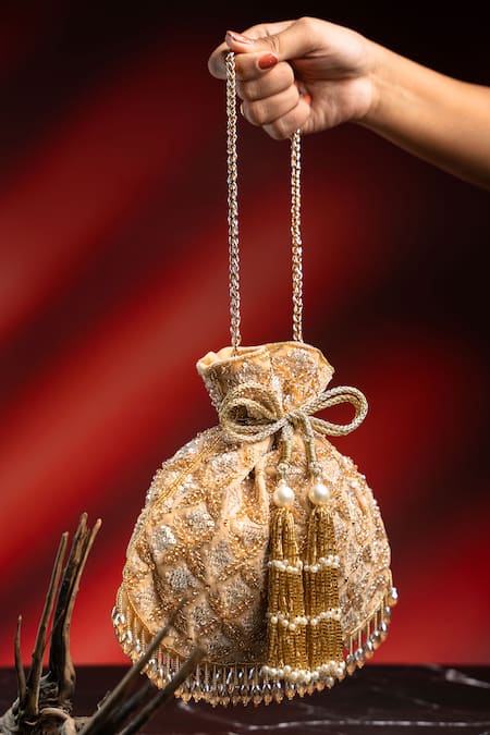 Nayaab By Sonia_Gold Embroidery, Metallic Thread, Tassels, Pearls, Beads, Leafy Lattice Potli _Online_at_Aza_Fashions