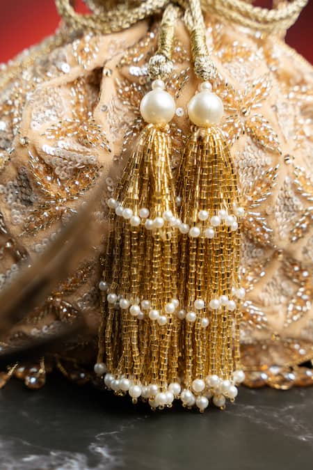 Shop_Nayaab By Sonia_Gold Embroidery, Metallic Thread, Tassels, Pearls, Beads, Leafy Lattice Potli _Online_at_Aza_Fashions