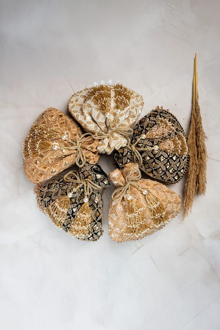 Nayaab By Sonia_Gold Embroidery, Metallic Thread, Tassels, Pearls, Beads, Leafy Lattice Potli _at_Aza_Fashions