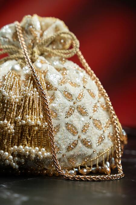 Shop_Nayaab By Sonia_Ivory Embroidery, Sequins, Pearls, Beads, Crystals, Fringe Leafy Lattice Potli _Online_at_Aza_Fashions