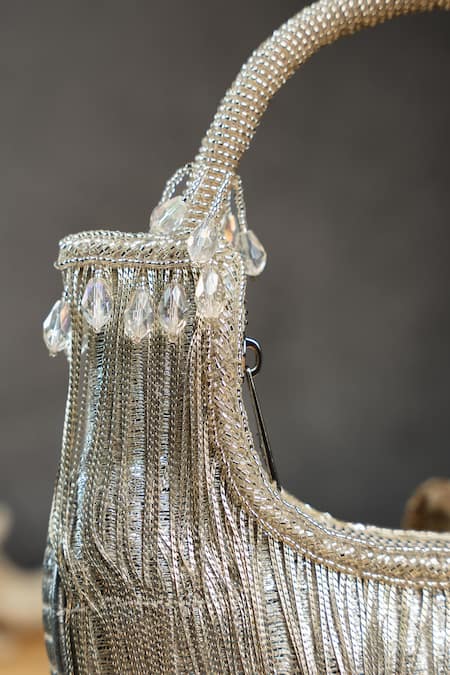 Shop_Nayaab By Sonia_Silver Chains, Tassels, Beads Hinted Sailor Metallic Bag _Online_at_Aza_Fashions