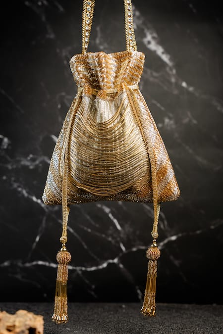 Nayaab By Sonia Hinted Metallic Potli 