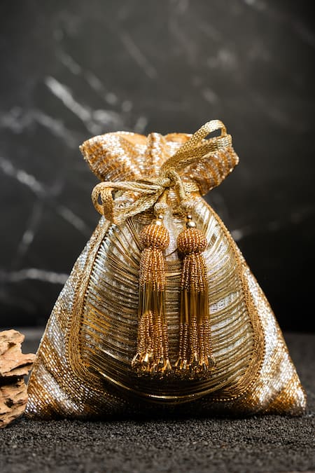 Shop_Nayaab By Sonia_Gold Tassels, Chains Hinted Metallic Potli _Online_at_Aza_Fashions