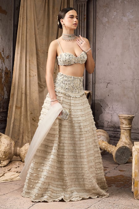 Buy Rocky Star Ivory Net, Silk Sequins, Beads, Ruffles Embellished Blouse And Tiered Lehenga Set Online at Aza Fashions Buy_Rocky Star_Ivory Net, Silk Sequins, Beads, Ruffles Embellished Blouse And Tiered Lehenga Set _Online_at_Aza_Fashions