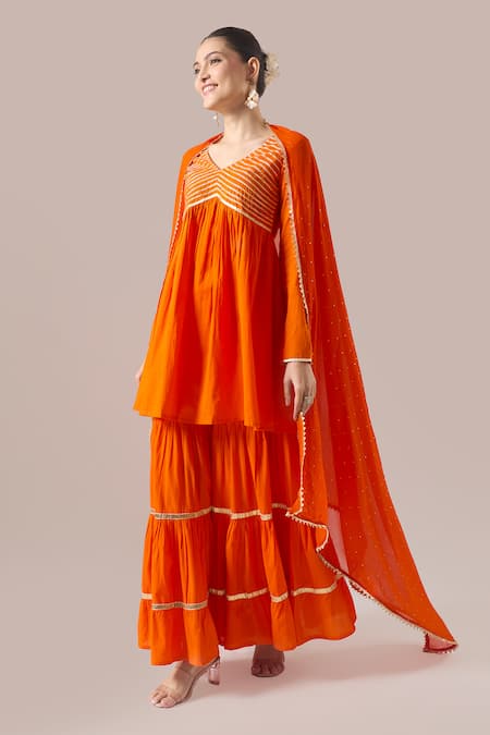 Naintara Bajaj Orange Cotton Gota Patti V-neck Work Kurta Sharara Set at Aza Fashions Naintara Bajaj_Orange Cotton Gota Patti V-neck Work Kurta Sharara Set _at_Aza_Fashions