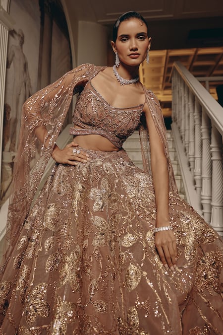 Adaara Couture_Gold Net, Organza, Satin Beads, Sequins, Lehenga Set With Draped Cape _at_Aza_Fashions