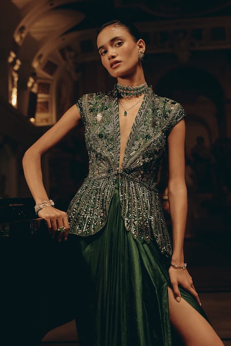 Adaara Couture_Emerald Green Net Sequins, Beads, Embellished Peplum Top And Pleated Skirt Set _at_Aza_Fashions