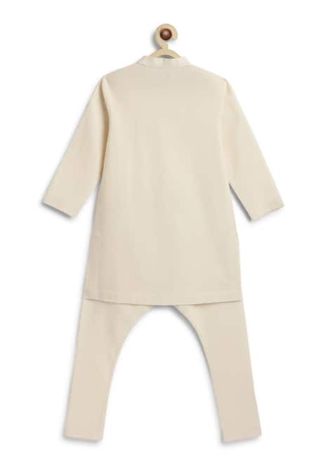 Shop Tiber Taber Cream Cotton Plain Kurta And Pyjama Set at Aza Fashions Shop_Tiber Taber_Cream Cotton Plain Kurta And Pyjama Set _at_Aza_Fashions