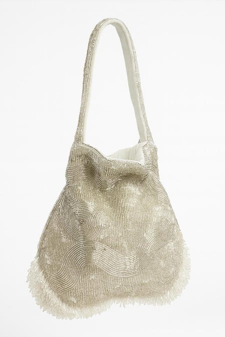 Tasna_Silver Stones, Beads, Tassels Handcrafted And Embellished Potli Bag _Online_at_Aza_Fashions