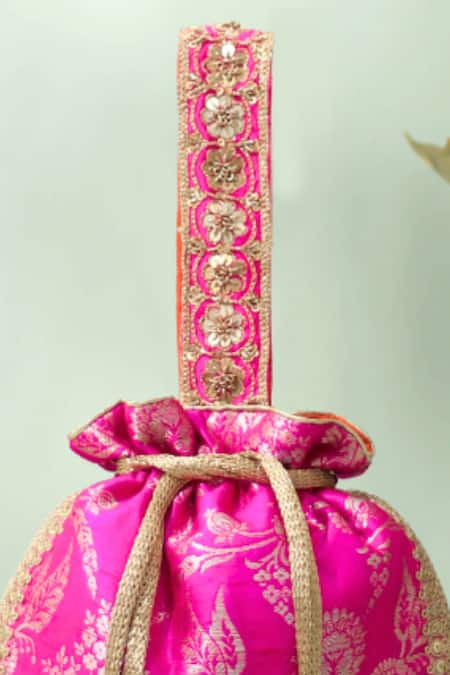 Amyra_Pink Embroidery, Tassels, Metallic Thread Arith Floral Brocade Potli_Online_at_Aza_Fashions