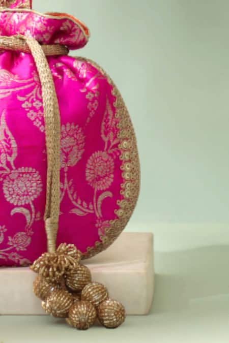 Buy_Amyra_Pink Embroidery, Tassels, Metallic Thread Arith Floral Brocade Potli_Online_at_Aza_Fashions