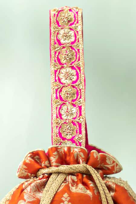 Buy_Amyra_Orange Embroidery, Zari, Tassels, Beads Taroob Handwoven Brocade Potli_Online_at_Aza_Fashions