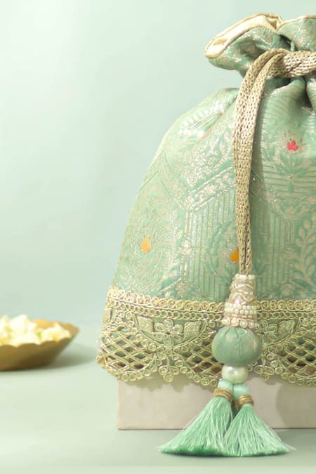 Buy_Amyra_Green Tassels, Beads, Metallic Thread Ruva Katan Silk Woven Potli Bag_Online_at_Aza_Fashions