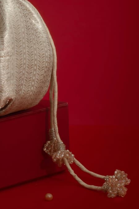 Amyra_Gold Embroidery, Sequins, Beads, Tassels Tej Floral Potli Bag _Online_at_Aza_Fashions