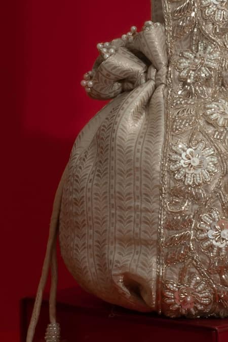Buy_Amyra_Gold Embroidery, Sequins, Beads, Tassels Tej Floral Potli Bag _Online_at_Aza_Fashions