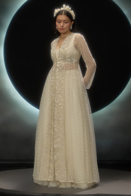 Couture By Niharika Ivory Net Embroidery, Sequins V-, Open Evania Hand Jacket Skirt Set Online at Aza Fashions Couture By Niharika_Ivory Net Embroidery, Sequins V-, Open Evania Hand Jacket Skirt Set _Online_at_Aza_Fashions