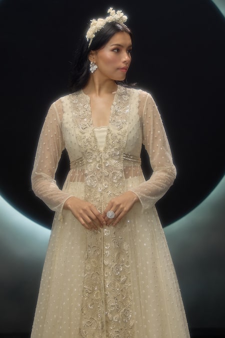 Couture By Niharika Ivory Net Embroidery, Sequins V-, Open Evania Hand Jacket Skirt Set at Aza Fashions Couture By Niharika_Ivory Net Embroidery, Sequins V-, Open Evania Hand Jacket Skirt Set _at_Aza_Fashions