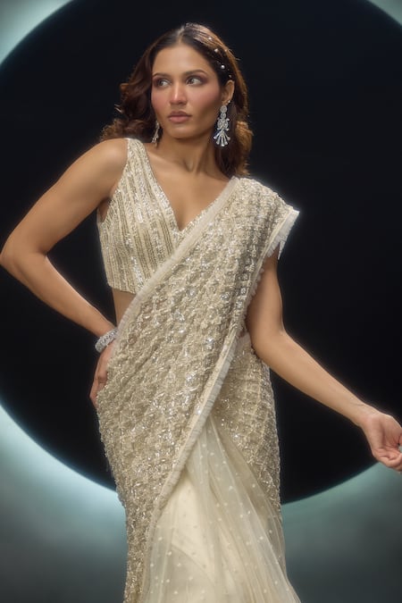 Couture By Niharika_Ivory Net Embroidery, Sequins V-neck Alvara Pre-draped Saree With Blouse _at_Aza_Fashions