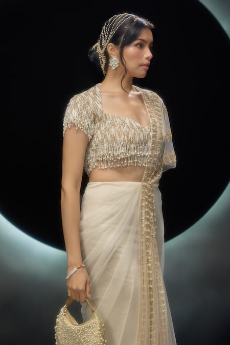 Buy_Couture By Niharika_Gold Net Embroidery, Sequins, Zari, Oreline Hand Pre-draped Saree With Blouse _Online_at_Aza_Fashions