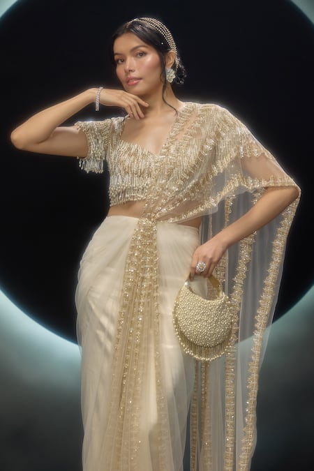 Couture By Niharika_Gold Net Embroidery, Sequins, Zari, Oreline Hand Pre-draped Saree With Blouse _at_Aza_Fashions