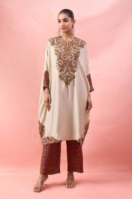 Debyani + CO_Ivory Embroidery, Beads Round Neck Aastha Pitta Work Kaftan With Pant _at_Aza_Fashions