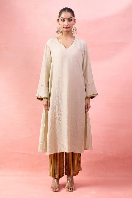 Buy_Debyani + CO_White Embroidery, Sequins V-, Round Crushed Kurta Set With Bib Top _Online_at_Aza_Fashions