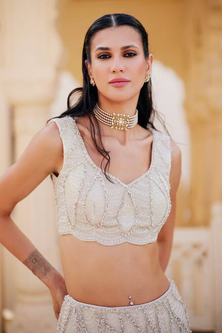 Charu And Vasundhara_Ivory Net Sequins, Beads, Embroidery Kirsten Embellished Lehenga And Blouse Set _Online_at_Aza_Fashions