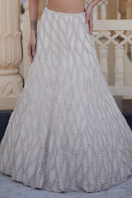 Buy_Charu And Vasundhara_Ivory Net Sequins, Beads, Embroidery Kirsten Embellished Lehenga And Blouse Set _Online_at_Aza_Fashions