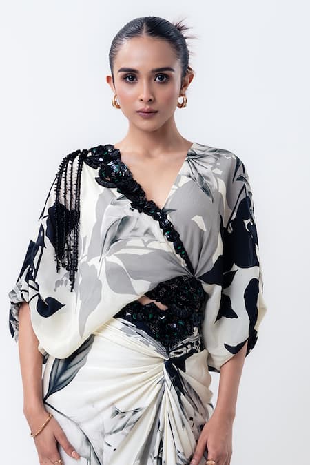 Nupur Kanoi Off White Crepe, Satin Sequins Printed Kimono Wrap Top With Side Knot Skirt Online at Aza Fashions Nupur Kanoi_Off White Crepe, Satin Sequins Printed Kimono Wrap Top With Side Knot Skirt _Online_at_Aza_Fashions