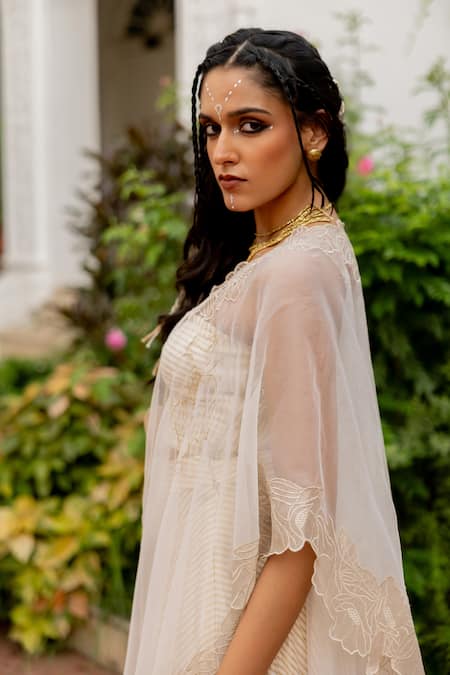 Chambray & CO._Ivory Cotton, Silk, Tissue Embroidery, Tassels Open Yutika Cape And Skirt Set _Online_at_Aza_Fashions