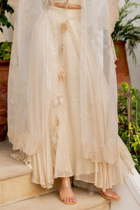 Buy_Chambray & CO._Ivory Cotton, Silk, Tissue Embroidery, Tassels Open Yutika Cape And Skirt Set _Online_at_Aza_Fashions