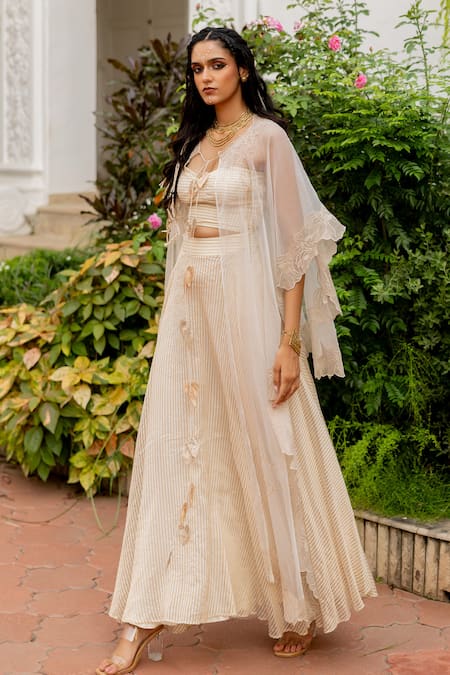 Shop_Chambray & CO._Ivory Cotton, Silk, Tissue Embroidery, Tassels Open Yutika Cape And Skirt Set _Online_at_Aza_Fashions