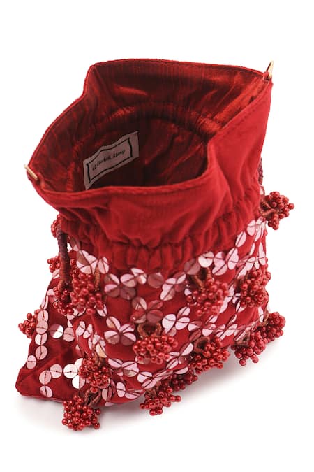 Buy_A Clutch Story_Maroon Beads, Sequins, Embroidery, Tassels Gulab Embellished Potli _Online_at_Aza_Fashions