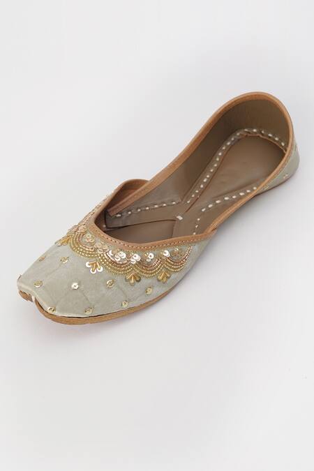 Sole Mates by Palak_Gold Sitara Embellished Raw Silk Juttis _at_Aza_Fashions