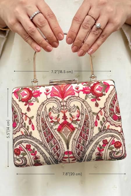Amyra Off White Embroidery, Sequins Rumi Thread Clutch at Aza Fashions Amyra_Off White Embroidery, Sequins Rumi Thread Clutch _at_Aza_Fashions